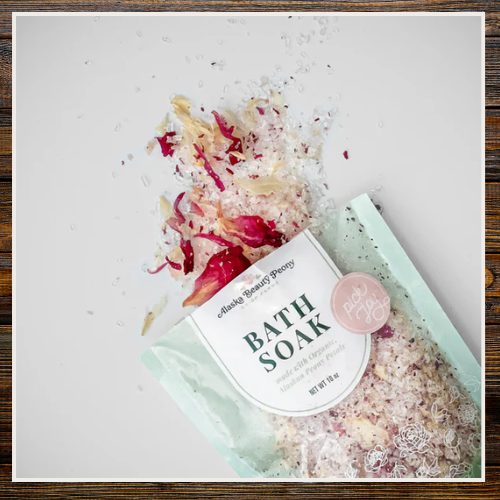 Bath soak with floral petals and packaging on a light background  | Alaska Beauty Peony Cooperative | Homer, AK